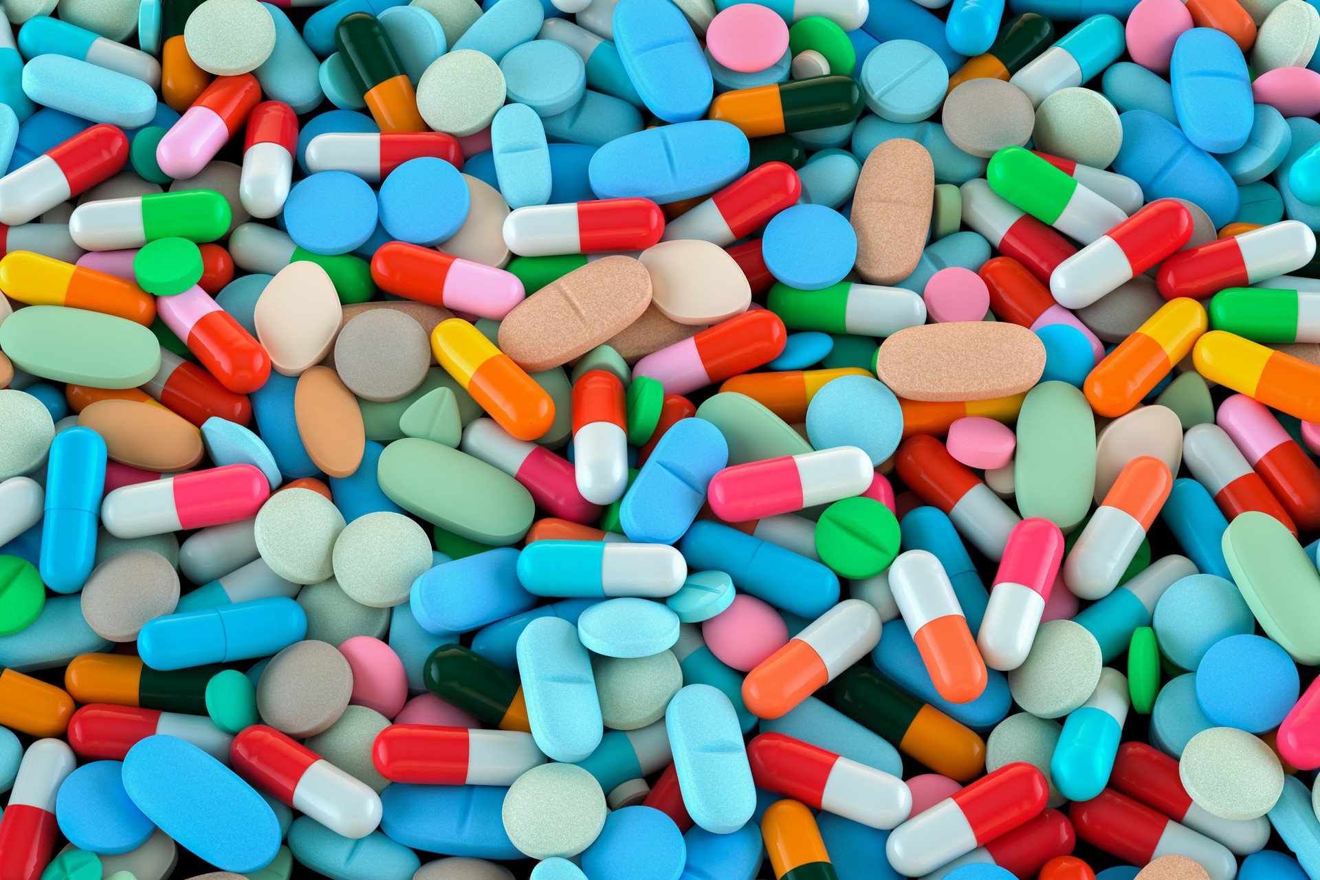 The pile of capsule drug in the container background